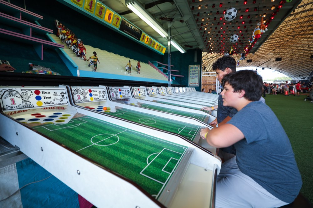 Students playing games at the back of the pavilion