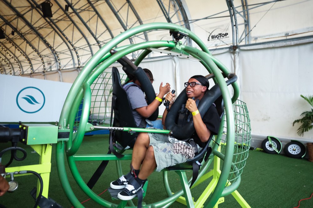 Students riding the GyroSphere